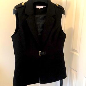 Black vest with leather clip